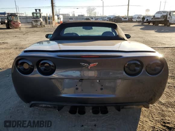 2009 Chevrolet Corvette с VIN 1G1YY36W795107256, выставлен на аукционе Copart как лот 50815345 с пробегом 112 147 миль миль и Списание • Salvage title. История ставок и продаж доступна на DreamBid. Изображение 6.