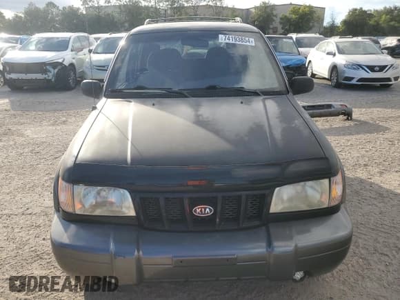 ✅ 2002 Kia Sportage • VIN: KNDJB723625167905 • Lot: 74193854. Listed on Copart with 98,864 mi. Free auction sales archive from the USA and detailed vehicle history report at DreamBid. Image 5.