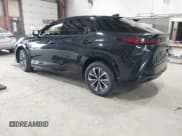 ✅ 2024 Lexus RZ 300e Premium • VIN: JTJABABB3RA005717 • Lot: 42503641. Listed on IAAI with 15,009 mi. Free auction sales archive from the USA and detailed vehicle history report at DreamBid. Image 3.