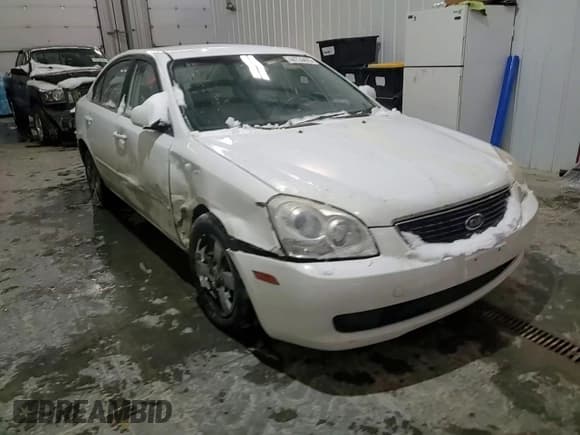 ✅ 2006 Kia Optima LX • VIN: KNAGE123465048543 • Lot: 44724475. Listed on Copart with 225,227 mi. Free auction sales archive from the USA and detailed vehicle history report at DreamBid. Image 10.