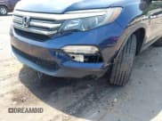 ✅ 2018 Honda Pilot EX-L • VIN: 5FNYF6H5XJB013698 • Lot: 42986201. Listed on IAAI with 63,873 mi. Free auction sales archive from the USA and detailed vehicle history report at DreamBid. Image 14.