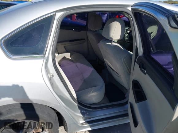 ✅ 2014 Chevrolet Impala LS • VIN: 2G1WA5E34E1176884 • Lot: 43670350. Listed on IAAI with 218,818 mi. Free auction sales archive from the USA and detailed vehicle history report at DreamBid. Image 8.