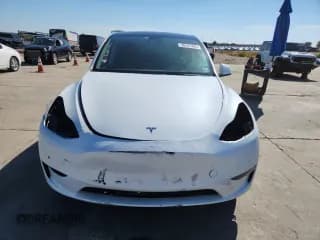 ✅ 2022 Tesla Model Y Long Range • VIN: 7SAYGAEEXNF337604 • Lot: 86461865. Listed on Copart with 103,502 mi. Free auction sales archive from the USA and detailed vehicle history report at DreamBid. Image 5.