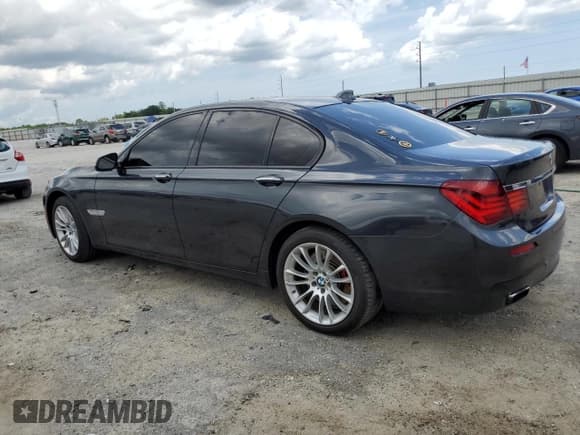 ✅ 2015 BMW 7 Series 750i • VIN: WBAYA8C54FD825401 • Lot: 67568435. Listed on Copart with 139,594 mi. Free auction sales archive from the USA and detailed vehicle history report at DreamBid. Image 2.