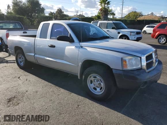 2006 Dodge Dakota ST with VIN 1D7HE22K76S609622, listed as a Copart auction lot 78209784 with 96,599 mi miles and Salvage title. Bid and sale history available at DreamBid. Image 4.