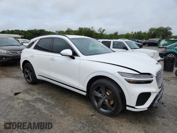 ✅ 2023 Genesis GV70 Sport • VIN: KMUMCDTC1PU129533 • Lot: 59606075. Listed on Copart with 34,462 mi. Free auction sales archive from the USA and detailed vehicle history report at DreamBid. Image 4.