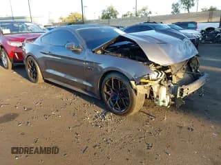 ✅ 2021 Ford Mustang GT • VIN: 1FA6P8CF4M5102999 • Lot: 43295957. Listed on IAAI with 66,338 mi. Free auction sales archive from the USA and detailed vehicle history report at DreamBid. Image 1.