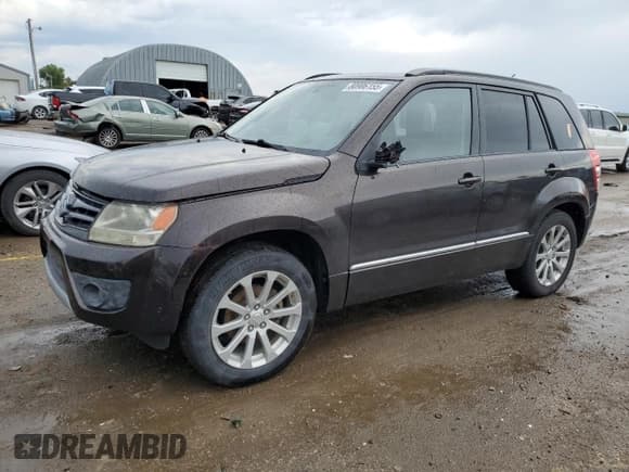 ✅ 2013 Suzuki Grand Vitara Limited • VIN: JS3TE0D79D4100068 • Lot: 80906155. Listed on Copart with 164,452 mi. Free auction sales archive from the USA and detailed vehicle history report at DreamBid. Image 1.