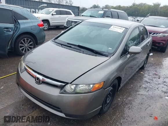 ✅ 2006 Honda Civic LX • VIN: 1HGFA16516L140308 • Lot: 43611984. Listed on IAAI with 242,560 mi. Free auction sales archive from the USA and detailed vehicle history report at DreamBid. Image 2.