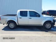 ✅ 2018 Nissan Frontier SV • VIN: 1N6AD0ER6JN742419 • Lot: 43183517. Listed on IAAI with 233,517 mi. Free auction sales archive from the USA and detailed vehicle history report at DreamBid. Image 14.