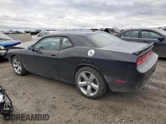 ✅ 2012 Dodge Challenger SXT • VIN: 2C3CDYAG7CH208795 • Lot: 86140684. Wystawiony na Copart z przebiegiem 58 937 mil. Bezpłatny archiwum sprzedaży aukcyjnych z USA i szczegółowy raport historii pojazdu na DreamBid. Zdjęcie 2.