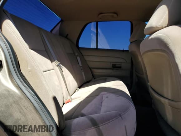 ✅ 2003 Ford Crown Victoria Standard • VIN: 2FAFP73W63X150334 • Lot: 62402895. Listed on Copart with 130,296 mi. Free auction sales archive from the USA and detailed vehicle history report at DreamBid. Image 10.