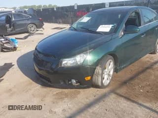 ✅ 2014 Chevrolet Cruze LTZ • VIN: 1G1PG5SB0E7299616 • Lot: 42916554. Listed on IAAI with 137,873 mi. Free auction sales archive from the USA and detailed vehicle history report at DreamBid. Image 6.