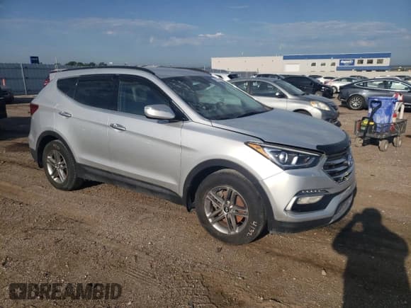 ✅ 2018 Hyundai Santa Fe 2.4L • VIN: 5XYZU3LB4JG554387 • Лот: 62936593. Опубликован ранее на Copart с пробегом Не указан. Бесплатный доступ к архиву аукционных продаж из США и подробный отчёт об истории автомобиля на DreamBid. Изображение 4.