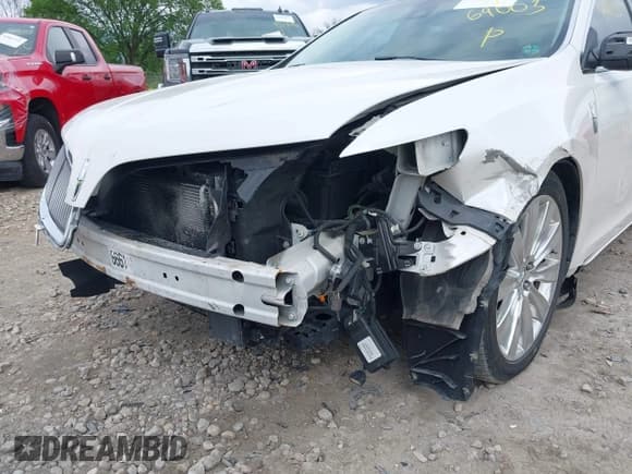 ✅ 2015 Lincoln MKS EcoBoost • VIN: 1LNHL9FT0FG604000 • Lot: 42369003. Listed on IAAI with 83,590 mi. Free auction sales archive from the USA and detailed vehicle history report at DreamBid. Image 6.