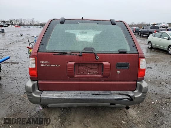✅ 2002 Isuzu Rodeo • VIN: 4S2CK58D124323937 • Lot: 86155194. Listed on Copart with 184,491 mi. Free auction sales archive from the USA and detailed vehicle history report at DreamBid. Image 6.