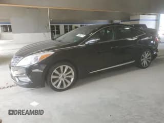 ✅ 2013 Hyundai Azera • VIN: KMHFH4JG5DA319475 • Лот: 80907775. Опубликован ранее на Copart с пробегом 135 993 миль. Бесплатный доступ к архиву аукционных продаж из США и подробный отчёт об истории автомобиля на DreamBid. Изображение 1.