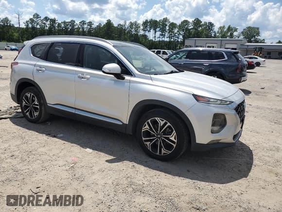 ✅ 2019 Hyundai Santa Fe Limited • VIN: 5NMS5CAA8KH048674 • Lot: 61808145. Listed on Copart with 94,464 mi. Free auction sales archive from the USA and detailed vehicle history report at DreamBid. Image 4.