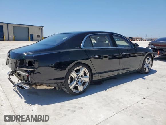 ✅ 2014 Bentley Flying Spur • VIN: SCBEC9ZA8EC088818 • Lot: 61191335. Wystawiony na Copart z przebiegiem 26 781 mil. Bezpłatny archiwum sprzedaży aukcyjnych z USA i szczegółowy raport historii pojazdu na DreamBid. Zdjęcie 3.