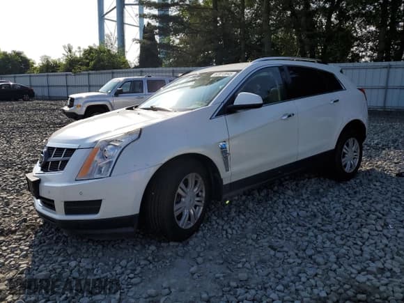 ✅ 2012 Cadillac SRX Luxury Collection • VIN: 3GYFNDE35CS526668 • Лот: 62813945. Опубликован ранее на Copart с пробегом 123 844 миль. Бесплатный доступ к архиву аукционных продаж из США и подробный отчёт об истории автомобиля на DreamBid. Изображение 1.