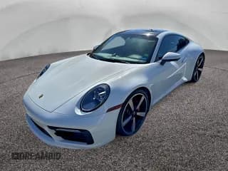 ✅ 2021 Porsche 911 Carrera S • VIN: WP0AB2A92MS222329 • Лот: 94590185. Опубликован ранее на Copart с пробегом 22 811 миль. Бесплатный доступ к архиву аукционных продаж из США и подробный отчёт об истории автомобиля на DreamBid. Изображение 2.