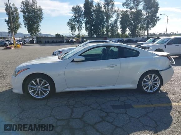 ✅ 2014 Infiniti Q60 Journey • VIN: JN1CV6EK0EM111064 • Lot: 43819034. Wystawiony na IAAI z przebiegiem 82 610 mil. Bezpłatny archiwum sprzedaży aukcyjnych z USA i szczegółowy raport historii pojazdu na DreamBid. Zdjęcie 14.