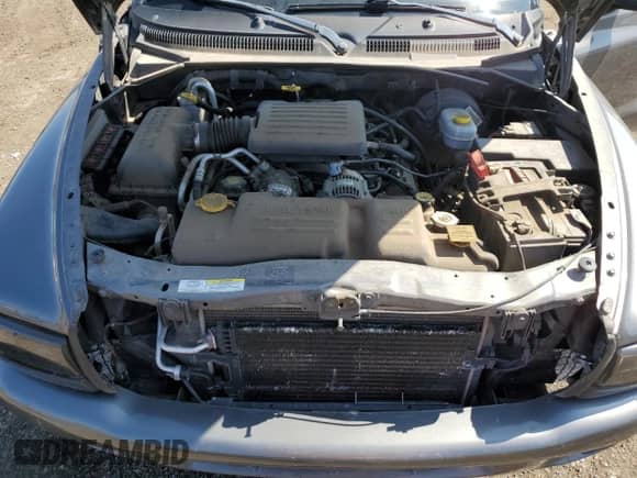 2003 Dodge Dakota Sport z VIN 1D7HG38N13S101403, wystawiony jako Copart lot #50814875 z przebiegiem 15 396 mil mil oraz Czysty tytuł • Clean title. Historia ofert i sprzedaży dostępna na DreamBid. Obrazek 11.