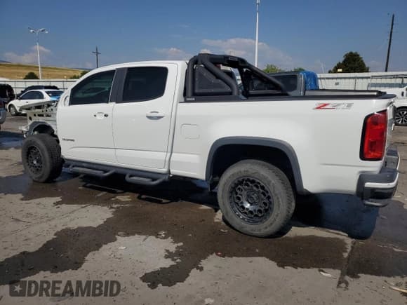 ✅ 2015 Chevrolet Colorado 4WD Z71 • VIN: 1GCGTCE30F1117168 • Лот: 63427044. Опубликован ранее на Copart с пробегом 164 972 миль. Бесплатный доступ к архиву аукционных продаж из США и подробный отчёт об истории автомобиля на DreamBid. Изображение 2.