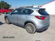 ✅ 2016 Mazda CX-5 Sport • VIN: JM3KE2BY9G0650696 • Lot: 43758478. Wystawiony na IAAI z przebiegiem 123 501 mil. Bezpłatny archiwum sprzedaży aukcyjnych z USA i szczegółowy raport historii pojazdu na DreamBid. Zdjęcie 3.