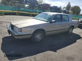 ✅ 1993 Dodge Dynasty LE • VIN: 1B3XC56R4PD186204 • Lot: 84626705. Listed on Copart with 130,345 mi. Free auction sales archive from the USA and detailed vehicle history report at DreamBid. Image 1.