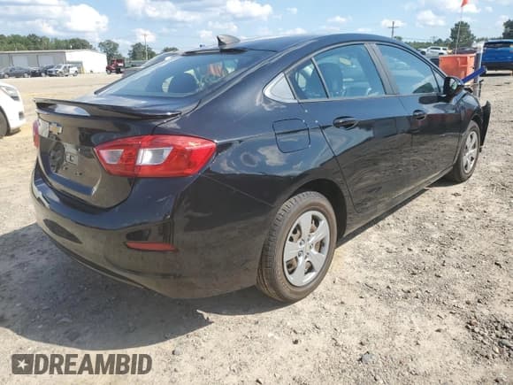 ✅ 2017 Chevrolet Cruze LS • VIN: 1G1BC5SM8H7193815 • Lot: 56256972. Listed on Copart with 105,339 mi. Free auction sales archive from the USA and detailed vehicle history report at DreamBid. Image 4.