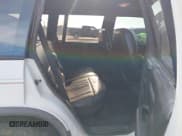 ✅ 1994 GMC Jimmy SLT • VIN: 1GKDT13W0R2513978 • Лот: 42091172. Опубликован ранее на IAAI с пробегом 115 582 миль. Бесплатный доступ к архиву аукционных продаж из США и подробный отчёт об истории автомобиля на DreamBid. Изображение 8.