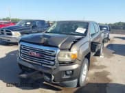 ✅ 2015 GMC Canyon 2WD SLE • VIN: 1GTG5BE34F1141493 • Lot: 42868941. Wystawiony na IAAI z przebiegiem 179 417 mil. Bezpłatny archiwum sprzedaży aukcyjnych z USA i szczegółowy raport historii pojazdu na DreamBid. Zdjęcie 2.