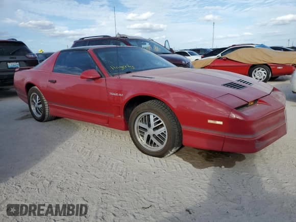 ✅ 1986 Pontiac Firebird Trans Am • VIN: 1G2FW87H0GL249284 • Lot: 76317174. Listed on Copart with 142,505 mi. Free auction sales archive from the USA and detailed vehicle history report at DreamBid. Image 4.