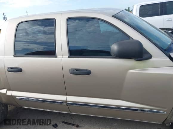2005 Dodge Dakota Laramie с VIN 1D7HE58N25S202907, выставлен на аукционе IAAI как лот 42654313 с пробегом 245 284 миль миль и . История ставок и продаж доступна на DreamBid. Изображение 14.
