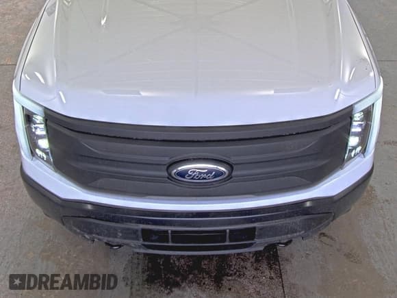 ✅ 2022 Ford F-150 Lightning Pro • VIN: 1FTVW1EL5NWG14902 • Lot: 43104671. Listed on IAAI with 91 mi. Free auction sales archive from the USA and detailed vehicle history report at DreamBid. Image 1.