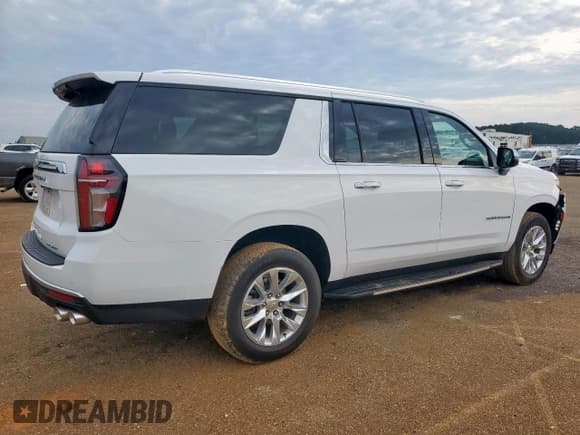 ✅ 2023 Chevrolet Suburban Premier • VIN: 1GNSCFKD7PR470834 • Lot: 84462395. Listed on Copart with 52,720 mi. Free auction sales archive from the USA and detailed vehicle history report at DreamBid. Image 3.