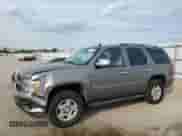2007 Chevrolet Tahoe LS z VIN 1GNEC13J27J127383, wystawiony jako Copart lot #84521875 z przebiegiem 246 578 mil mil oraz Szkoda całkowita • Salvage title. Historia ofert i sprzedaży dostępna na DreamBid. Obrazek 1.