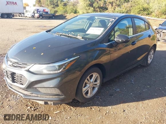 ✅ 2018 Chevrolet Cruze LT • VIN: 3G1BE6SM7JS645177 • Lot: 43475388. Listed on IAAI with 107,539 mi. Free auction sales archive from the USA and detailed vehicle history report at DreamBid. Image 17.
