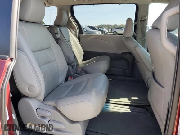 ✅ 2015 Toyota Sienna XLE • VIN: 5TDYK3DC9FS617213 • Lot: 91517655. Listed on Copart with 104,457 mi. Free auction sales archive from the USA and detailed vehicle history report at DreamBid. Image 11.