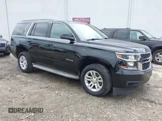 2015 Chevrolet Tahoe LT with VIN 1GNSCBKCXFR532936, listed as a IAAI auction lot 42923885 with 216,542 mi miles and . Bid and sale history available at DreamBid. Image 1.