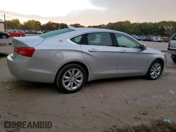 ✅ 2018 Chevrolet Impala LT • VIN: 2G1105S34J9106377 • Лот: 75186944. Опубликован ранее на Copart с пробегом 19 099 миль. Бесплатный доступ к архиву аукционных продаж из США и подробный отчёт об истории автомобиля на DreamBid. Изображение 3.