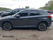 ✅ 2016 Mazda CX-5 Grand Touring • VIN: JM3KE2DY6G0840159 • Lot: 43179646. Wystawiony na IAAI z przebiegiem 71 500 mil. Bezpłatny archiwum sprzedaży aukcyjnych z USA i szczegółowy raport historii pojazdu na DreamBid. Zdjęcie 14.