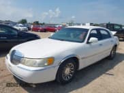 ✅ 1998 Lincoln Town Car Signature • VIN: 1LNFM82WXWY637398 • Lot: 42658093. Listed on IAAI with 91,600 mi. Free auction sales archive from the USA and detailed vehicle history report at DreamBid. Image 2.