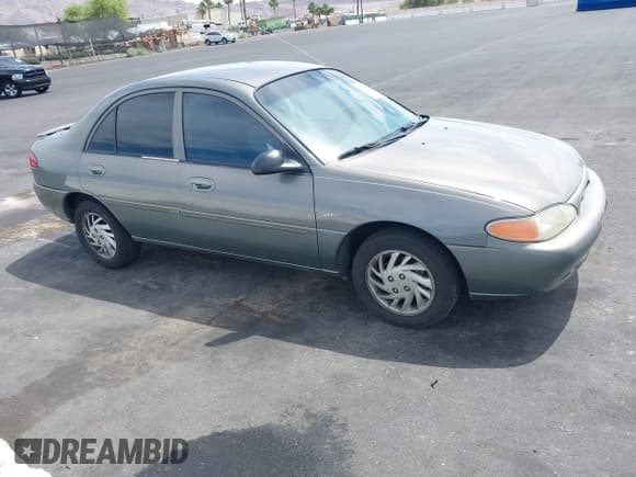 ✅ 1998 Ford Escort SE • VIN: 1FAFP13P0WW211988 • Lot: 42414467. Wystawiony na IAAI z przebiegiem 108 035 mil. Bezpłatny archiwum sprzedaży aukcyjnych z USA i szczegółowy raport historii pojazdu na DreamBid. Zdjęcie 12.