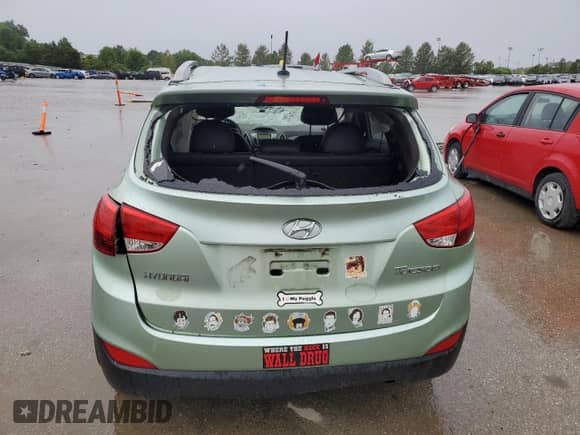 2013 Hyundai Tucson GLS z VIN KM8JU3AC4DU546815, wystawiony jako Copart lot #60543454 z przebiegiem 158 613 mil mil oraz Szkoda całkowita • Salvage title. Historia ofert i sprzedaży dostępna na DreamBid. Obrazek 6.