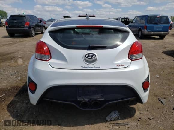 2013 Hyundai Veloster Turbo z VIN KMHTC6AE3DU111301, wystawiony jako Copart lot #67575034 z przebiegiem Nie podano mil oraz Szkoda całkowita • Salvage title. Historia ofert i sprzedaży dostępna na DreamBid. Obrazek 6.