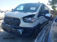 ✅ 2021 Ford Transit Cargo • VIN: 1FTBR1Y88MKA76509 • Lot: 42005100. Listed on IAAI with 34,029 mi. Free auction sales archive from the USA and detailed vehicle history report at DreamBid. Image 2.