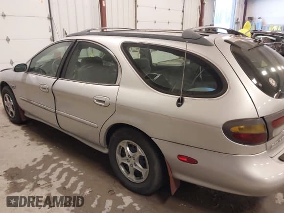 ✅ 1997 Mercury Sable GS • VIN: 1MELM55U4VA636253 • Лот: 43830423. Опубликован ранее на IAAI с пробегом 111 121 миль. Бесплатный доступ к архиву аукционных продаж из США и подробный отчёт об истории автомобиля на DreamBid. Изображение 3.