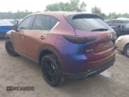 ✅ 2022 Mazda CX-5 S Carbon Edition • VIN: JM3KFBCM0N1584457 • Lot: 42743636. Listed on IAAI with 27,287 mi. Free auction sales archive from the USA and detailed vehicle history report at DreamBid. Image 3.